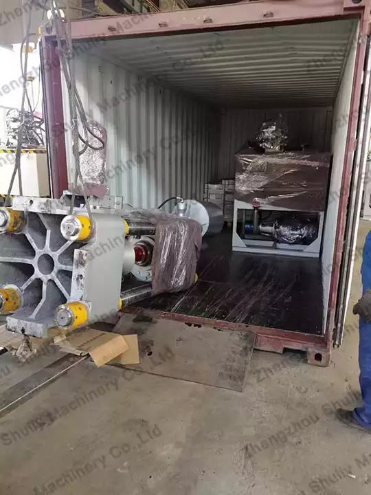 Loading the metal chip briquetter to the container