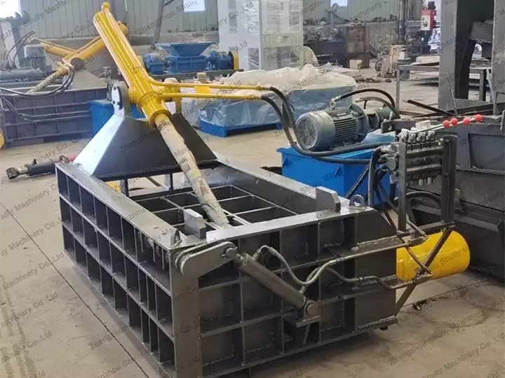 Iron scrap baling press