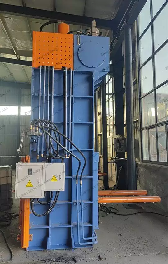 Vertical baler machine for tire recycling